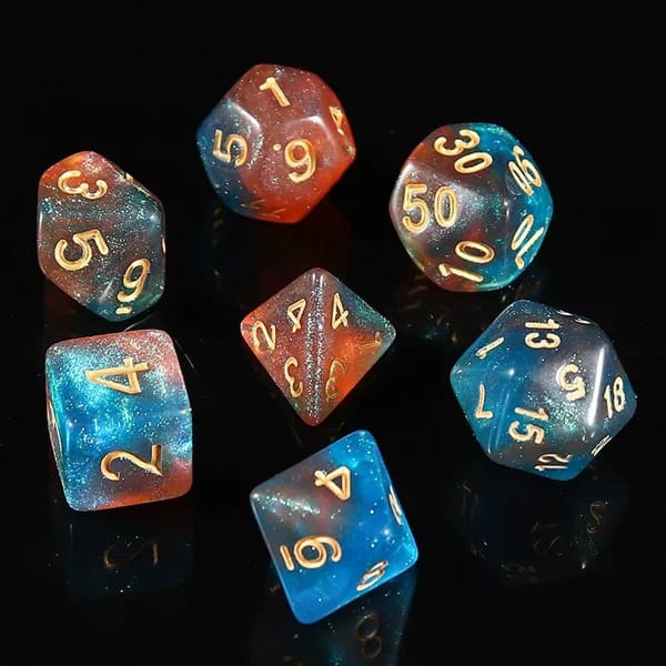 In-stock blue and orange galaxy glitter acrylic dice with gold numbers