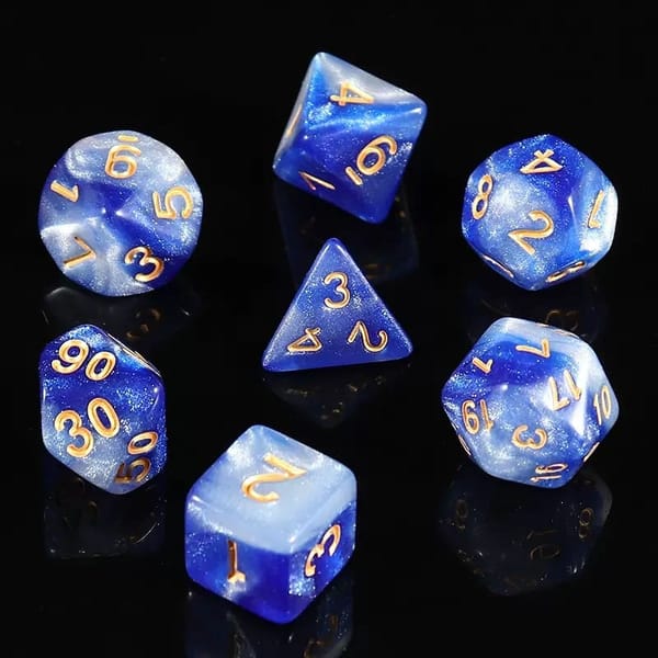 In-stock blue and white pearl swirl acrylic dice with gold numbers