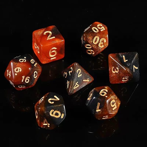 In-stock orange and black glitter acrylic dice with gold numbers