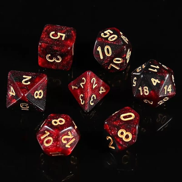 In-stock red and black galaxy glitter acrylic dice with gold numbers