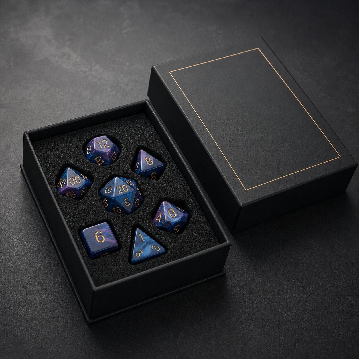 A custom dice set presented in a printed gift box with foam insert